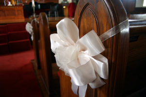 Beautiful close-up of a decorative bow used in a wedding.